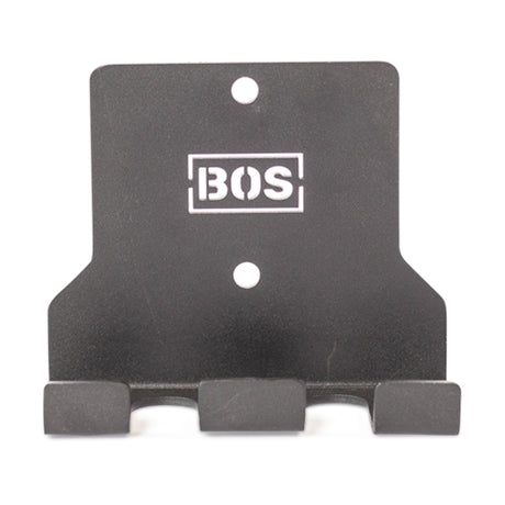 The Bells of Steel Hanging Barbell Holders are black metal wall hooks with three prongs and two mounting holes, featuring the BOS logo in white—perfect for organized storage and easy installation with compatible hardware.