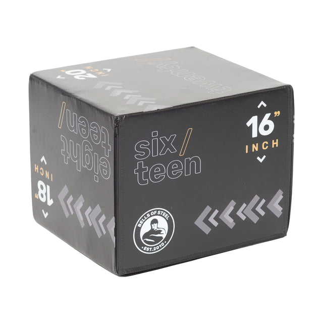 The Bells of Steel Foam Soft Plyo Box (16 x 18 x 20) is a versatile gym accessory in black leather featuring white and orange text with "sixteen" and "16 inch," a circular "LEVELS OF STEEL EST. 2020" logo, and dense foam surfaces adorned with diagonal arrow designs.