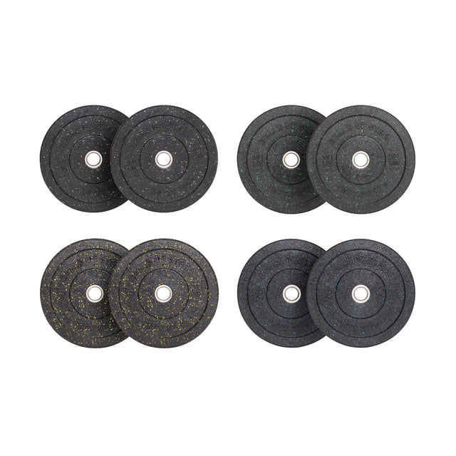 Eight black Crumb Bumper Plates by Bells of Steel, featuring colored flecks (red, green, yellow, blue) and metal centers arranged in two rows on a white background. These plates enhance weightlifting safety with a vibrant touch for your workout.
