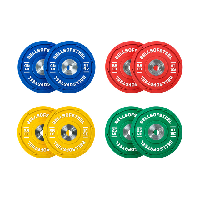 Four pairs of Bells of Steel Olympic weightlifting plates include blue (45 lb), red (35 lb), yellow (45 lb), and green (25 lb). Each "BELLSOFSTEEL" Urethane Bumper Plate features metallic centers.