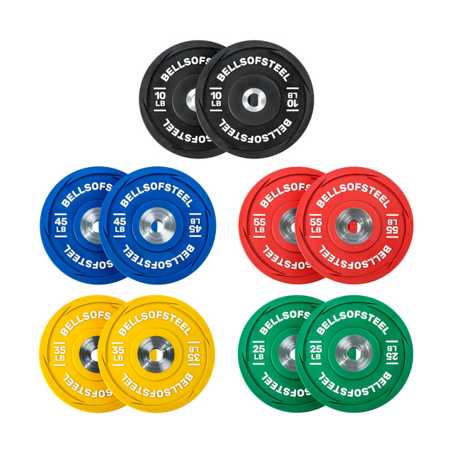 Bells of Steel's Urethane Bumper Plate Sets are colorful and durable for Olympic weightlifting, featuring black/red 10lb, green 25lb, yellow 35lb, and blue 45lb plates with a silver center for bar attachment. They showcase the "Bells of Steel" branding.