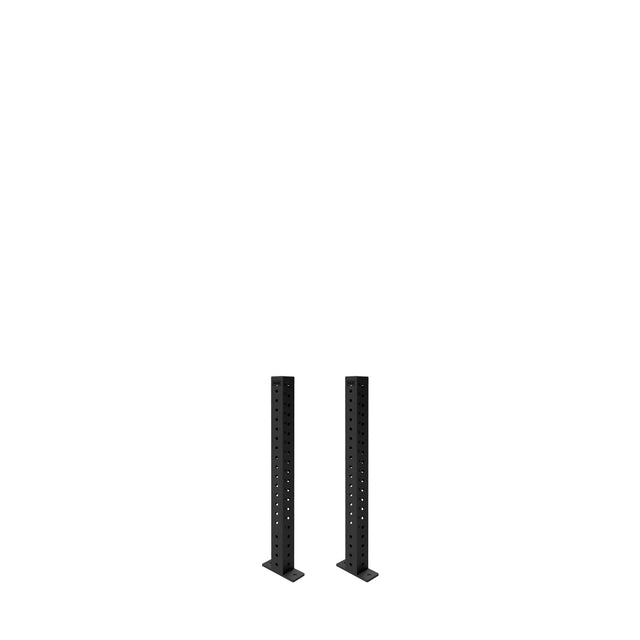 Two black Bells of Steel Hydra Vertical Uprights, each featuring a line of evenly spaced holes for attachments, stand parallel on a white background.