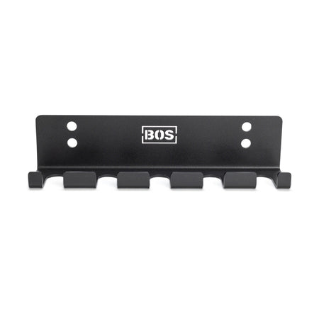 The Bells of Steel Hanging Barbell Holders is a black metal, wall-mounted rack with five hooks and four screw holes, featuring the BOS logo in white at the top—ideal for organizing your barbells.