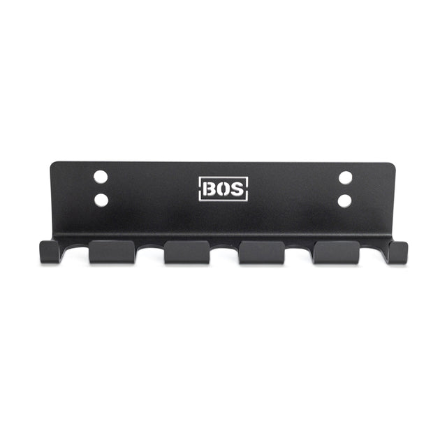 The Bells of Steel Hanging Barbell Holders is a black metal, wall-mounted rack with five hooks and four screw holes, featuring the BOS logo in white at the top—ideal for organizing your barbells.