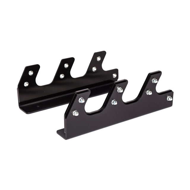 The Bells of Steel 3 Barbell Wall Rack features two black metal wall-mounted brackets with three angled slots each, secured by multiple silver screws, to organize and store barbells efficiently.