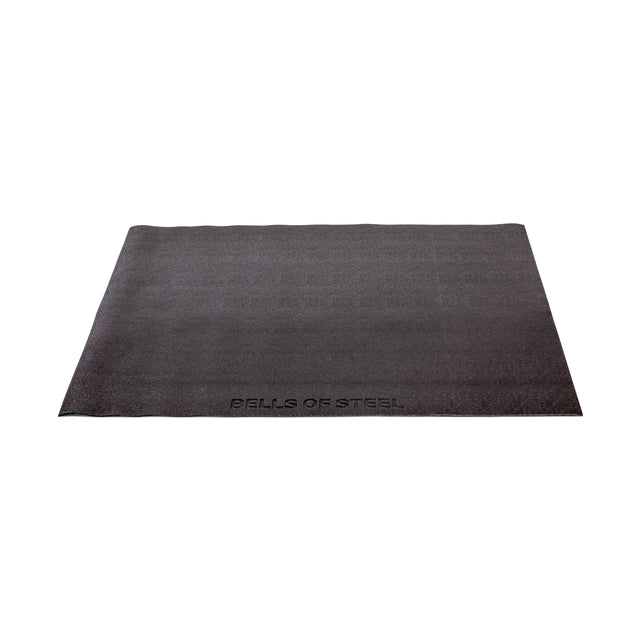 A large, rectangular Cardio Machine Floor Mat by Bells of Steel in black, featuring "BELLS OF STEEL" embossed at the front edge, displayed on a white background.