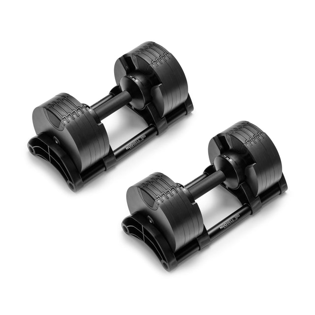 Two NÜOBELL Adjustable Dumbbells by Nuobell, featuring machined steel weight plates, are placed parallel on a white background. Each dumbbell has a cylindrical shape with a smooth, sleek design and marked weights on the sides.
