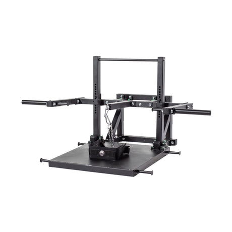The Bells of Steel Belt Squat Machine is a black metal unit with a flat platform, two horizontal handles, an adjustable frame, and a hanging chain for weights—perfect for home gym lower body workouts, shown on a white background.