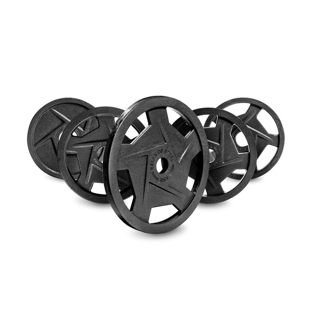 Five Bells of Steel Black Mighty Grip Olympic Weight Plates, featuring precision grip handles and embossed lettering, are arranged in a semi-circle and evenly spaced against a white background.