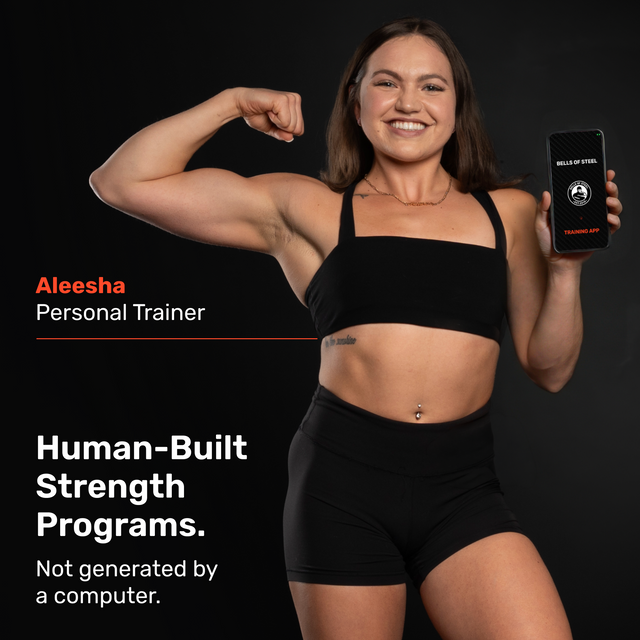 A woman in athletic wear flexes her bicep and shows a phone with her personalized program. Text: "Aleesha, Personal Trainer. Bells of Steel Online Coaching—Human-Built Strength Programs, not AI-generated.