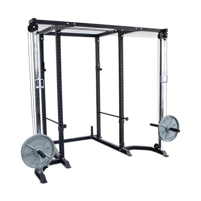 The Bells of Steel Cable Crossover (2.3" x 2.3" Racks) is a black metal power rack with a versatile pulley system and weight plate attachments, designed for strength training in gyms or home fitness spaces.