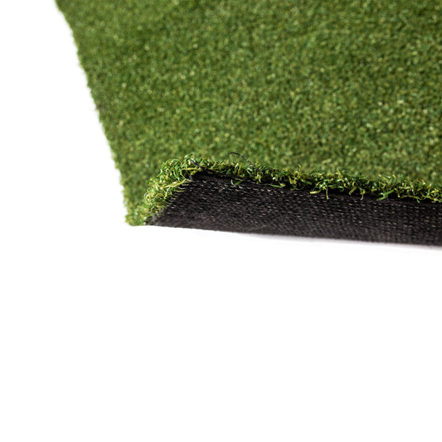 A close-up of the Bells of Steel Roll of Gym Turf shows green synthetic blades over a dark, textured backing, highlighting its layered construction—ideal for demanding activities like sled training.