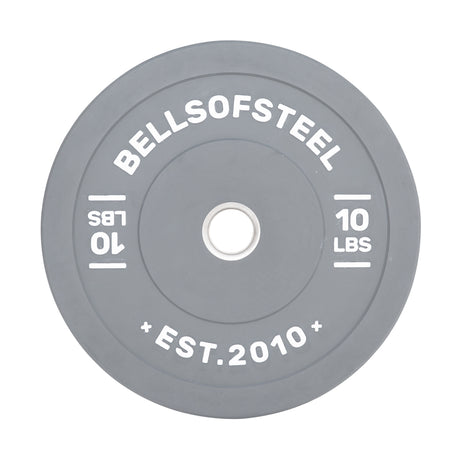 The gray Coloured Bumper Plate by Bells of Steel features "BELLSOFSTEEL" and "EST. 2010" in bold white text, an accurate weight, a durable stainless steel insert, and "10 LBS" marked on both sides around the center hole.
