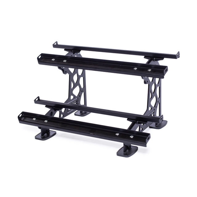 The Bells of Steel Commercial Interchangeable Weight Rack - Components Only is a black metal rooftop luggage rack with a modular design. It features intricate triangular cutout patterns on the supports and includes a swappable storage shelf, offering three tiers with adjustable bars for securing items, all set against a white background.