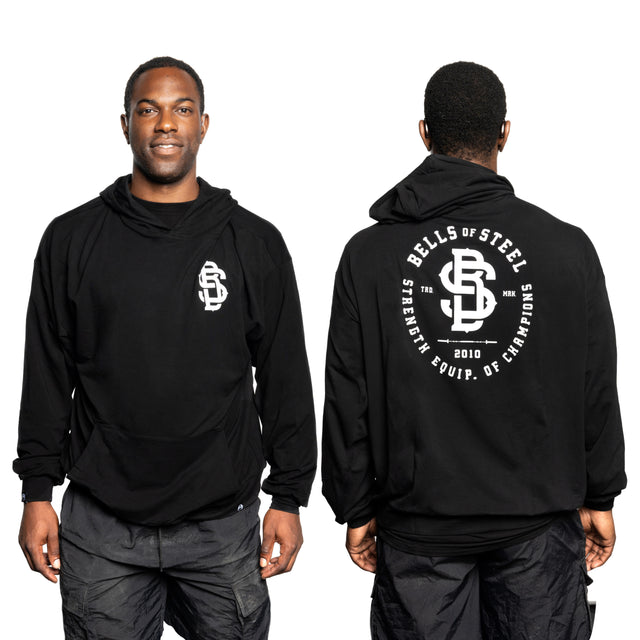 A man models the Bells of Steel Bamboo Hoodie in black, featuring a white brand logo on the front left chest and a large circular graphic with text on the back, shown both facing forward and from behind.