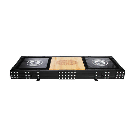 The Bells of Steel Weightlifting Platform is a rectangular black folding table with domino designs on the legs and corners, resembling a lifting platform. It has a wooden center tabletop with black sides displaying circular game-themed logos.