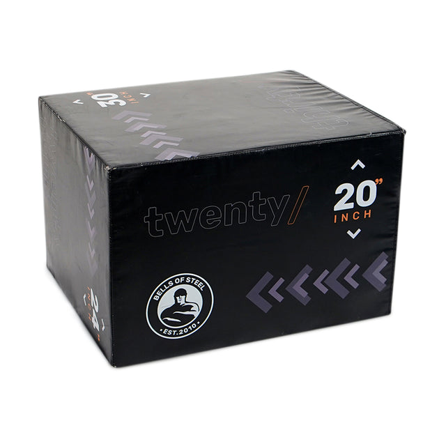 The Bells of Steel 6-In-1 Soft Foam Plyo Box / Squat Box is a black, space-saving exercise tool with "twenty/" and "20 inch" markings, logo, and white/purple arrows—ideal for versatile workouts in limited spaces.