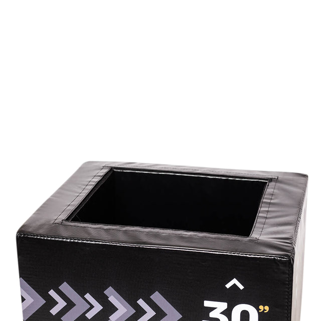 The Bells of Steel 6-In-1 Soft Foam Plyo Box / Squat Box is a black, cube-shaped exercise box featuring an open top, gray and white arrows, and the number "30" on the side—a space-efficient addition to any workout.