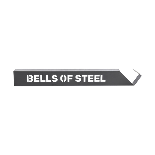 The Bells of Steel Foam Roller Storage is a black metal wall-mounted organizer featuring "BELLS OF STEEL" in white letters and a hooked end, shown against a white background.