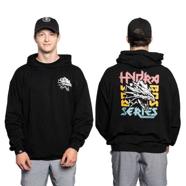 A person wears a black Bamboo Hoodie by Bells of Steel and gray shorts, shown from front and back. The hoodie displays a dragon graphic on the left chest and a bold, colorful "Hydra Bass Series" dragon design on the back.