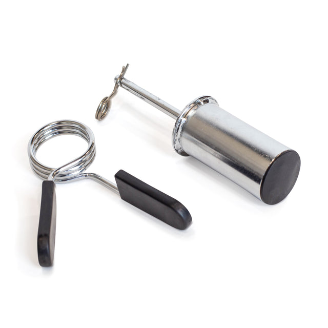 The Bells of Steel Weight Stack Pin is shown on a white background. Featuring a spring mechanism and black plastic handles, it securely holds weight plates in place, making it ideal for micro loading.