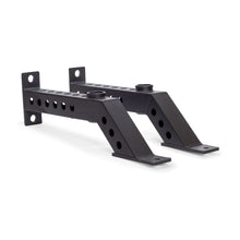 Two black metal Front Foot Stabilizers by Bells of Steel, angled with multiple holes for adjustable mounting, are shown side by side on a white background.