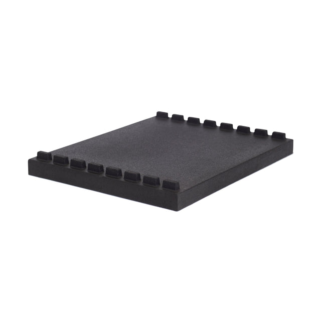The Bells of Steel Stackable Pull Blocks are rectangular black foam panels with evenly spaced notches along two edges, designed for efficient stacking or use as lifting blocks in gyms.