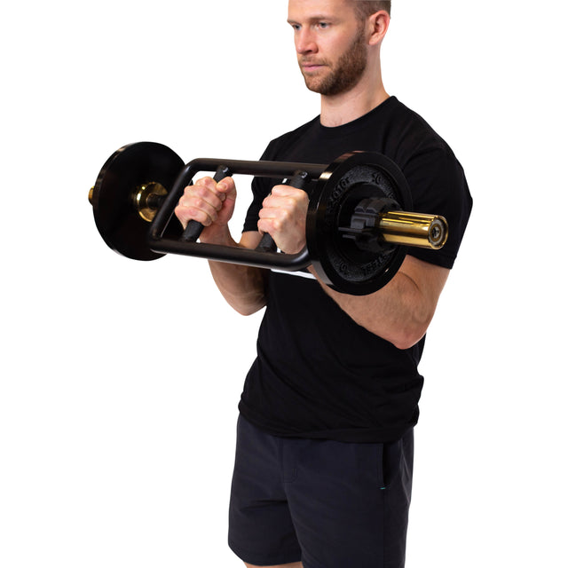 A man in a black t-shirt and shorts performs a bicep curl with the Bells of Steel Tricep Bar, which features ergonomic handles, against a white background.