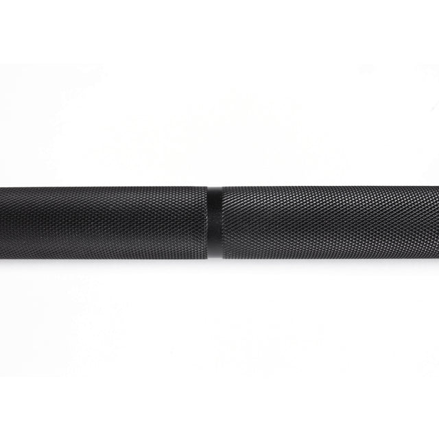 A close-up of the Bells of Steel Olympic Weightlifting Barbell on a white background highlights its black, textured finish, knurled grip, and smooth central ring—an ideal choice for top value and quality.