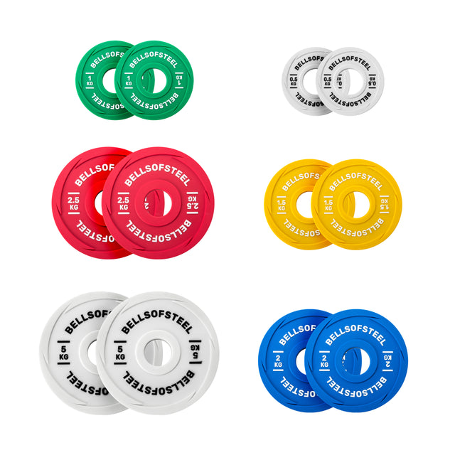 Six pairs of Bells of Steel Urethane-Coated Change Plate Sets in green, grey, red, yellow, white, and blue are displayed on a white background. Each features "BELLSOFSTEEL" and weight labels for durable use in any training plate setup.