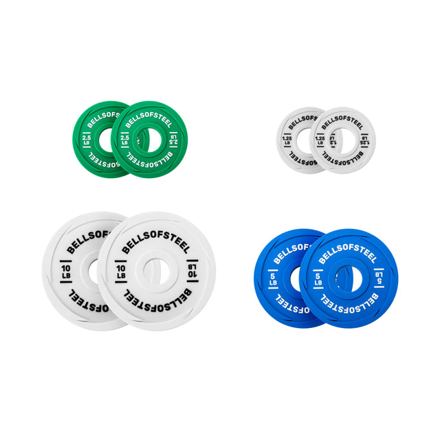 Four pairs of Bells of Steel Urethane-Coated Change Plate Sets, each in green, white, blue, and gray, are displayed on a white background—highlighting the premium durability ideal for serious training.