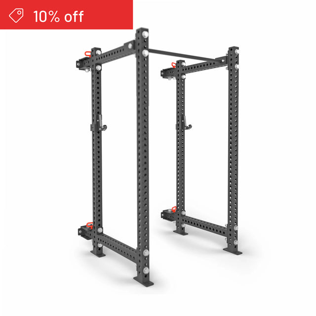 The Bells of Steel Manticore Folding Power Rack Builder (3" x 3", 1" holes) is shown in black on a white background with a red "10% off" banner—ideal for any home gym.