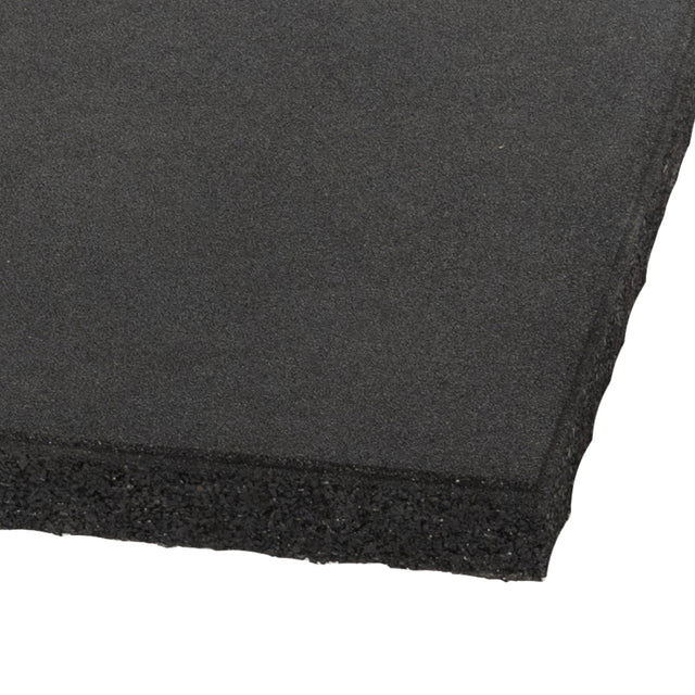Close-up of the Bells of Steel Deadlift Platform Rubber Tile, featuring a smooth black surface and textured edges, photographed on a white background; perfect for protecting floors or building a modular lifting platform.
