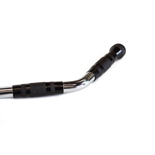 A close-up of the Bells of Steel MULTI-PURPOSE V STYLE BAR, a chrome-plated curved handlebar with black rubber grips on a white background, ideal as a cable machine attachment for versatile gym workouts.