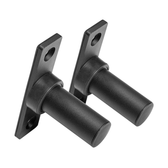 Two black Bolt-On Plate Pegs by Bells of Steel, featuring rectangular mounting plates with two screw holes, are angled right and side by side against a white background—perfect for organizing Olympic weight plates.