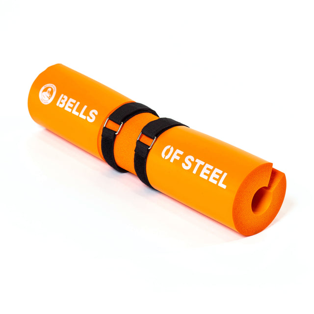 The ergonomic orange "Bells of Steel" Barbell Pads with Straps are cushy and comfortable, featuring black straps for secure rolling, ready to enhance your lifting experience.