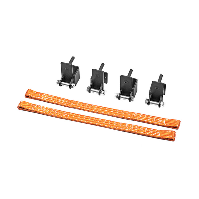 Two orange Bells of Steel Safety Straps for 2.3" x 2.3" racks and four black metal brackets with bolts are shown on a white background, perfect for protecting barbells and securing your power rack setup.