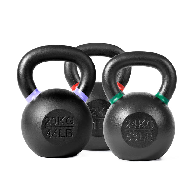 Three Bells of Steel Powder Coated Kettlebells with colored handle bands (16 kg/35 lbs, 20 kg/44 lbs, 24 kg/53 lbs) are shown—ideal for strength training and functional fitness.