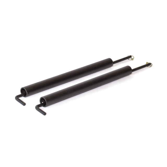 Two black metal tension springs with hooks and loops are shown parallel on a white background—ideal for use with Bells of Steel Pin Pipe Safeties in your power rack for added protection.