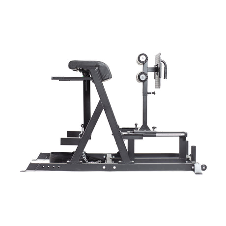 The Reverse Hammer 2 In 1 GHD And Reverse Back Extension by Bells of Steel features padded supports, adjustable settings, and a sturdy metallic frame in a sleek black design. It's ideal for reverse back extensions and leg curls, set against a plain white background.