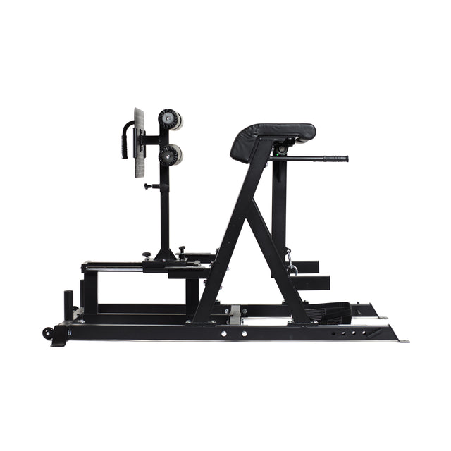 A side view of the Bells of Steel Reverse Hammer 2 In 1 GHD And Reverse Back Extension shows a black bench press machine with padded supports, adjustable bars, handles, and footrests, resembling a Glute Ham Developer. The design showcases its structure without weights attached.