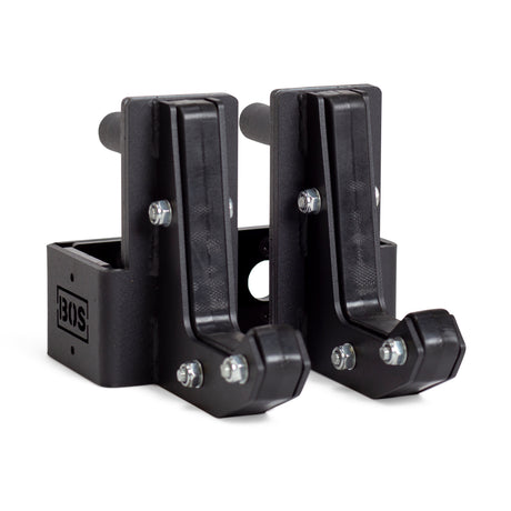 A pair of black Bells of Steel Sandwich J-Cups, made from metal and plastic for heavy-duty support, are essential squat rack accessories. Both are shown side by side on a white background.