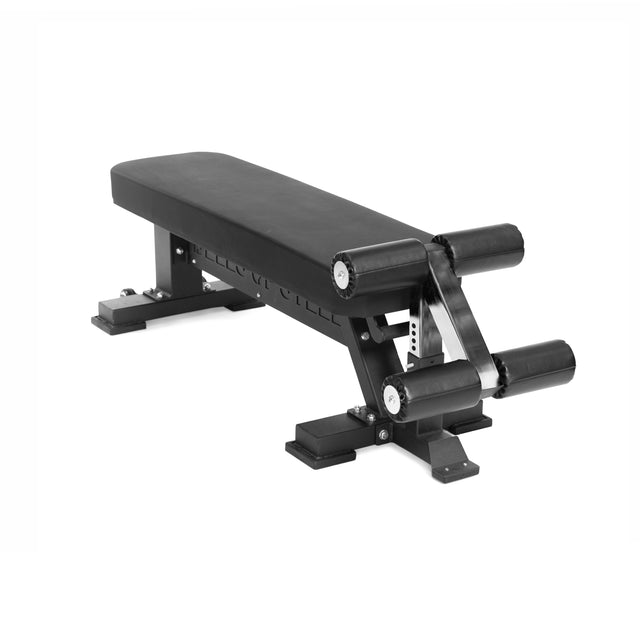 The Bells of Steel Hero Heavy-Duty Weight Bench, shown against a white background, features padded leg rollers for support and is built for strength training with a maximum capacity of 1,000lb.