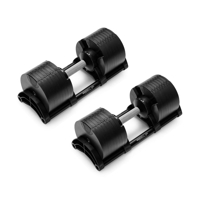 Two NÜOBELL Adjustable Dumbbells by Nuobell, featuring machined steel weight plates and silver handles, are placed side by side on a white background.