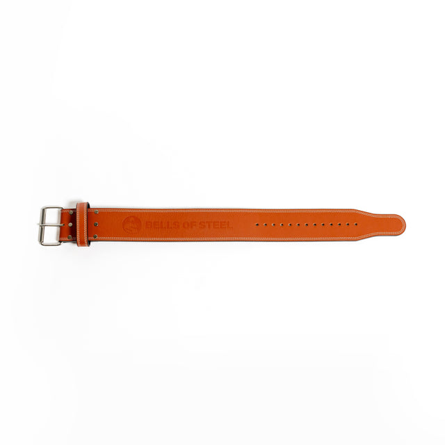 A brown leather watch strap with a buckle, crafted by Bells of Steel with the durability of their 10mm Leather Weightlifting Belt.