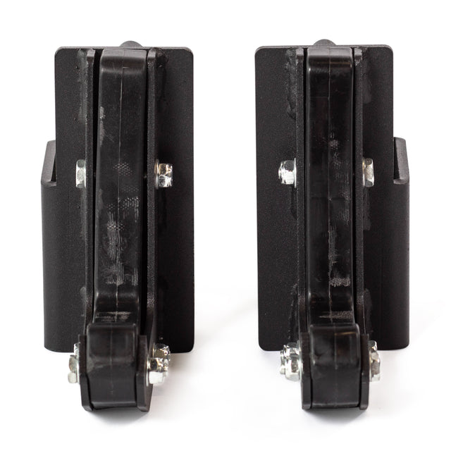 Two black Sandwich J-Cups by Bells of Steel with wheels are shown side by side on a white background. Each heavy-duty bracket features a vertical rectangular base and bolt fastenings, making them ideal squat rack accessories.