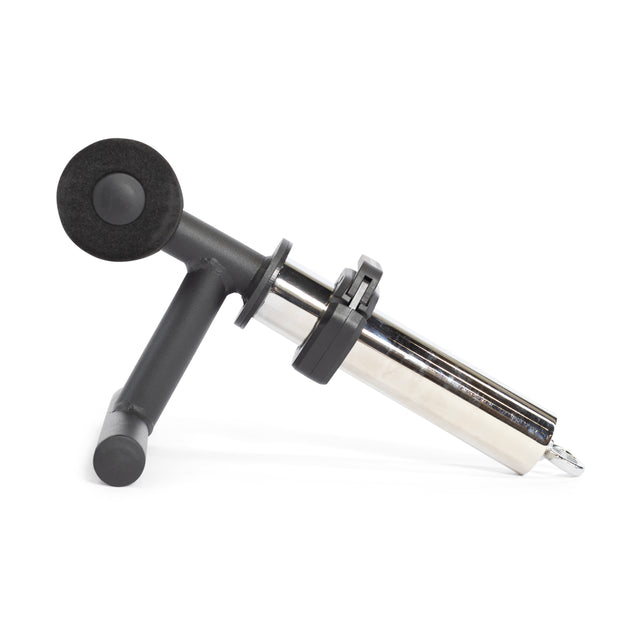 The Tibialis Trainer Bar by Bells of Steel Canada, with its sleek black and silver design featuring a cylindrical shaft and round components, is ideal for athletes looking to boost recovery when used alongside their Olympic weight plates.