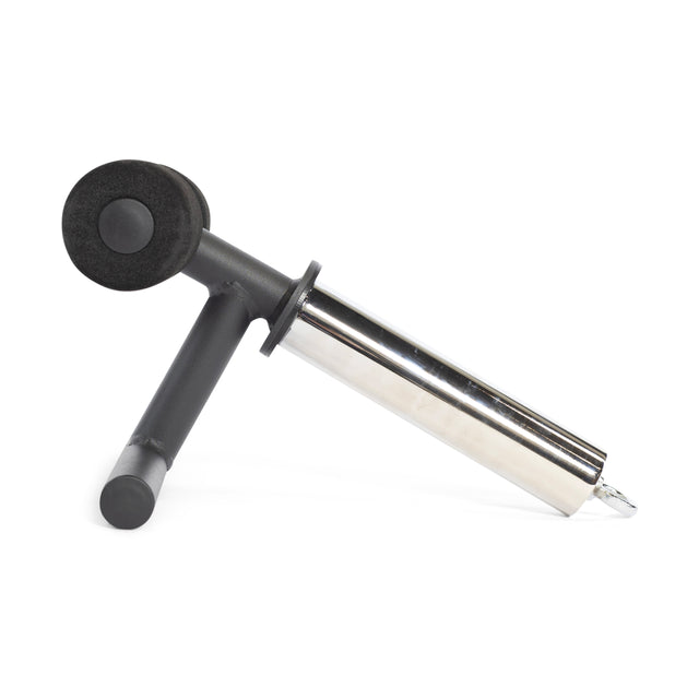 The Bells of Steel Tibialis Trainer Bar, a cylindrical metal exercise tool, features a black handle and is shown lying on its side against a white background—its sleek design echoes that of premium gym equipment.