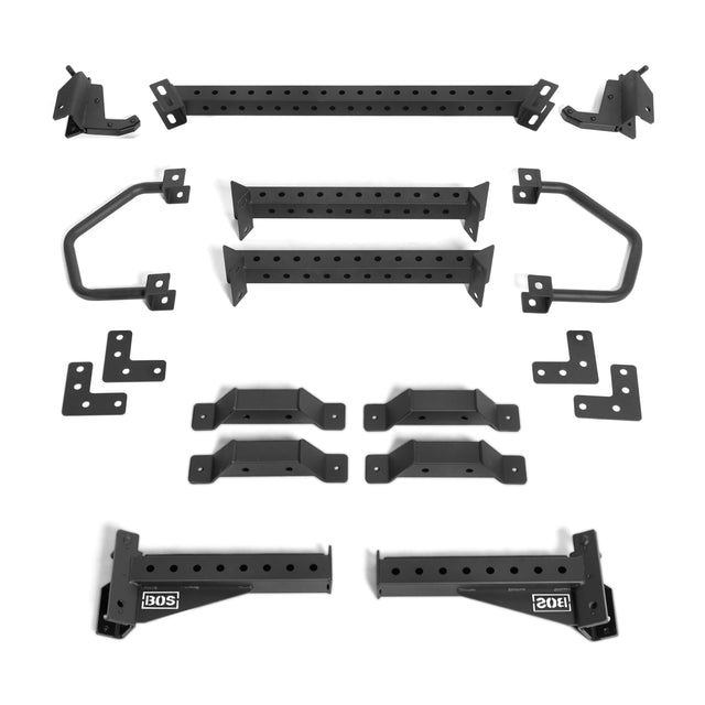 The Bells of Steel Functional Trainer Cable Tower hardware, featuring black metal brackets, perforated bars, angled joints, and labeled base pieces for assembly or installation, is neatly displayed on a white background.