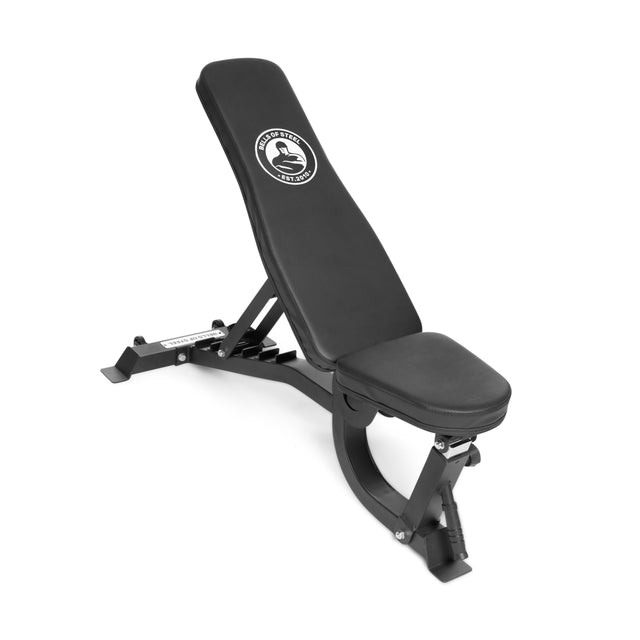 The Bells of Steel Adjustable Utility Bench features a padded seat and backrest with the logo, sturdy metal frame, incline setting, and supports up to 575lb for versatile workouts.